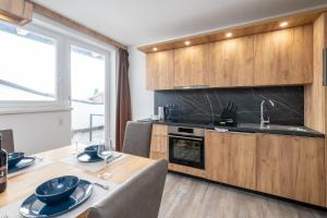 TOP 8 Apartment - Zell am See - Kaprun - カフェ（敷地内）, ピーゼンドルフ