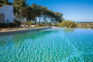 Hotel Masseria Fontanelle - Стирка постельного белья, полотенец и вещей гостей выполняется в соответствии с местными нормативными требованиями, Удженто