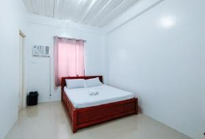 RedDoorz at Elton Guesthouse - Hotely, Numancia